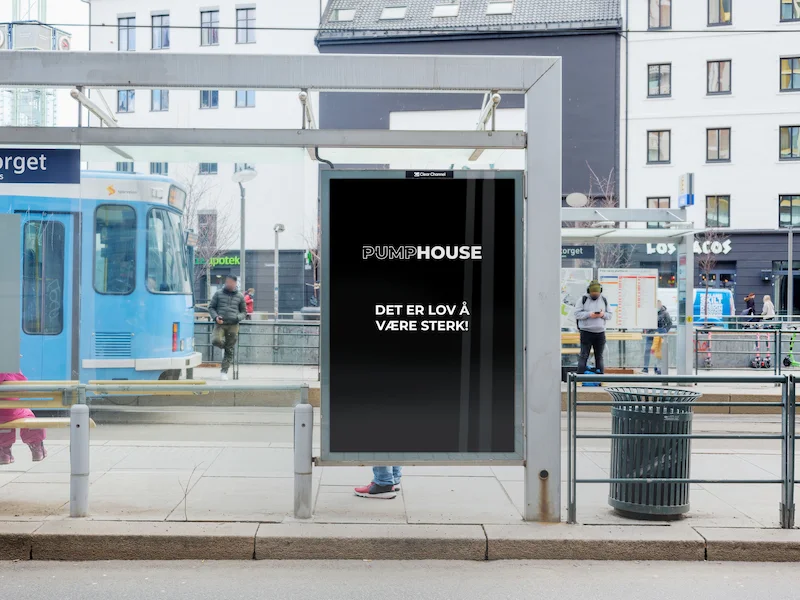 Bussholdeplass med pumphouse reklame